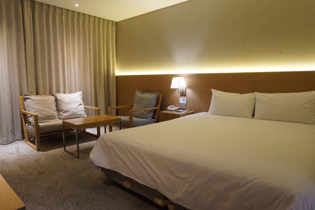 Astar Hotel Jeju Quarto foto